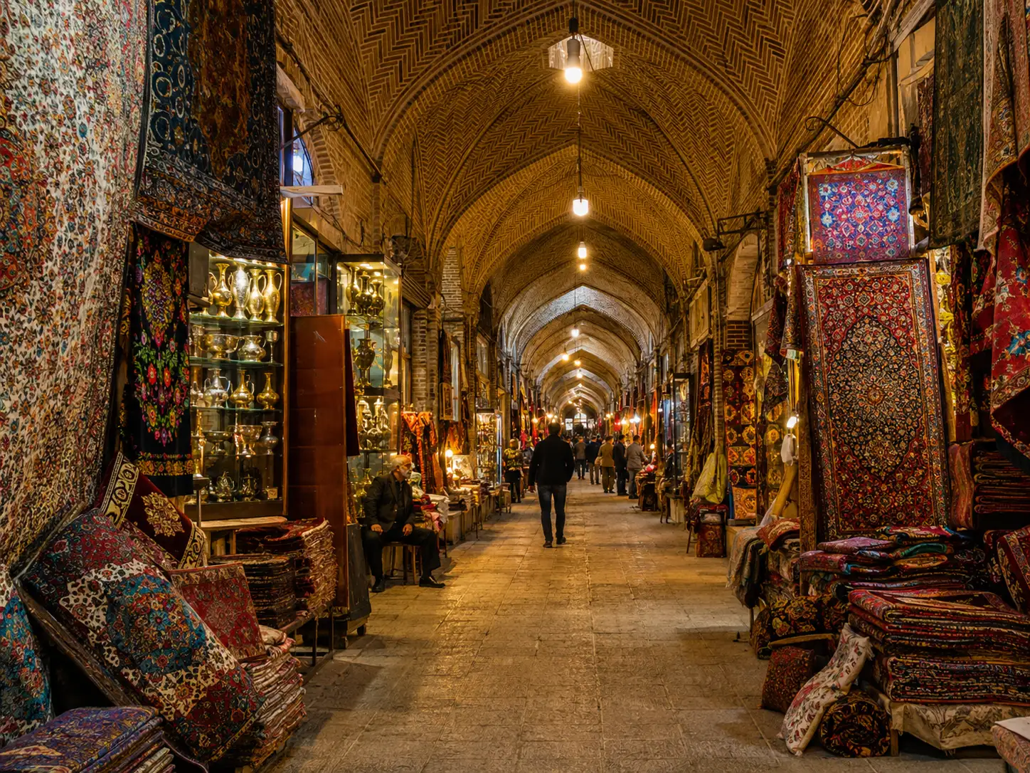 Traditional Persian bazaar interior with carpets and lights in Isfahan