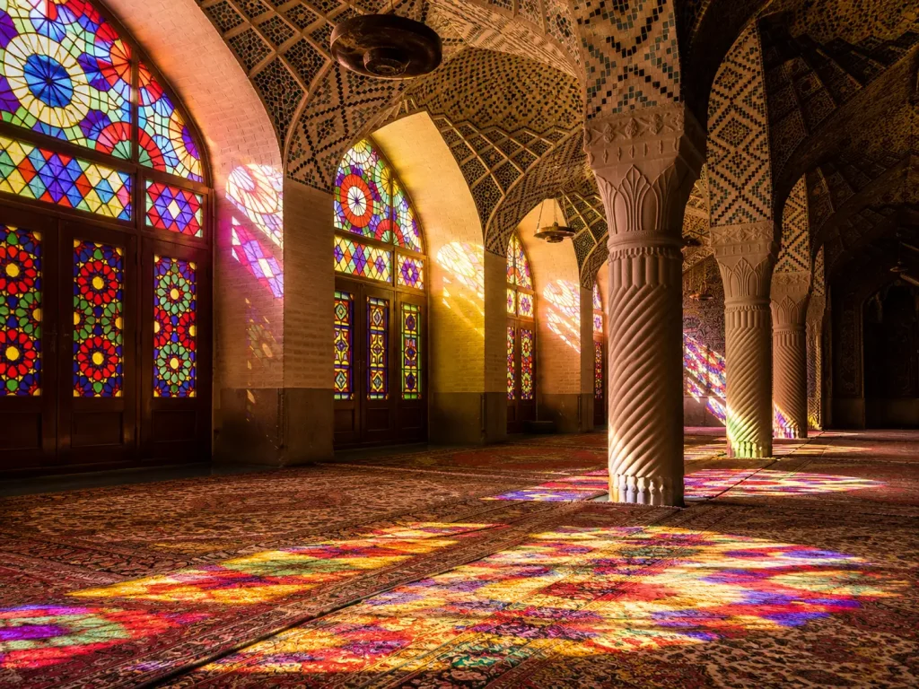 Colorful stained glass interior of Nasir al-Mulk Mosque in Shiraz, Iran